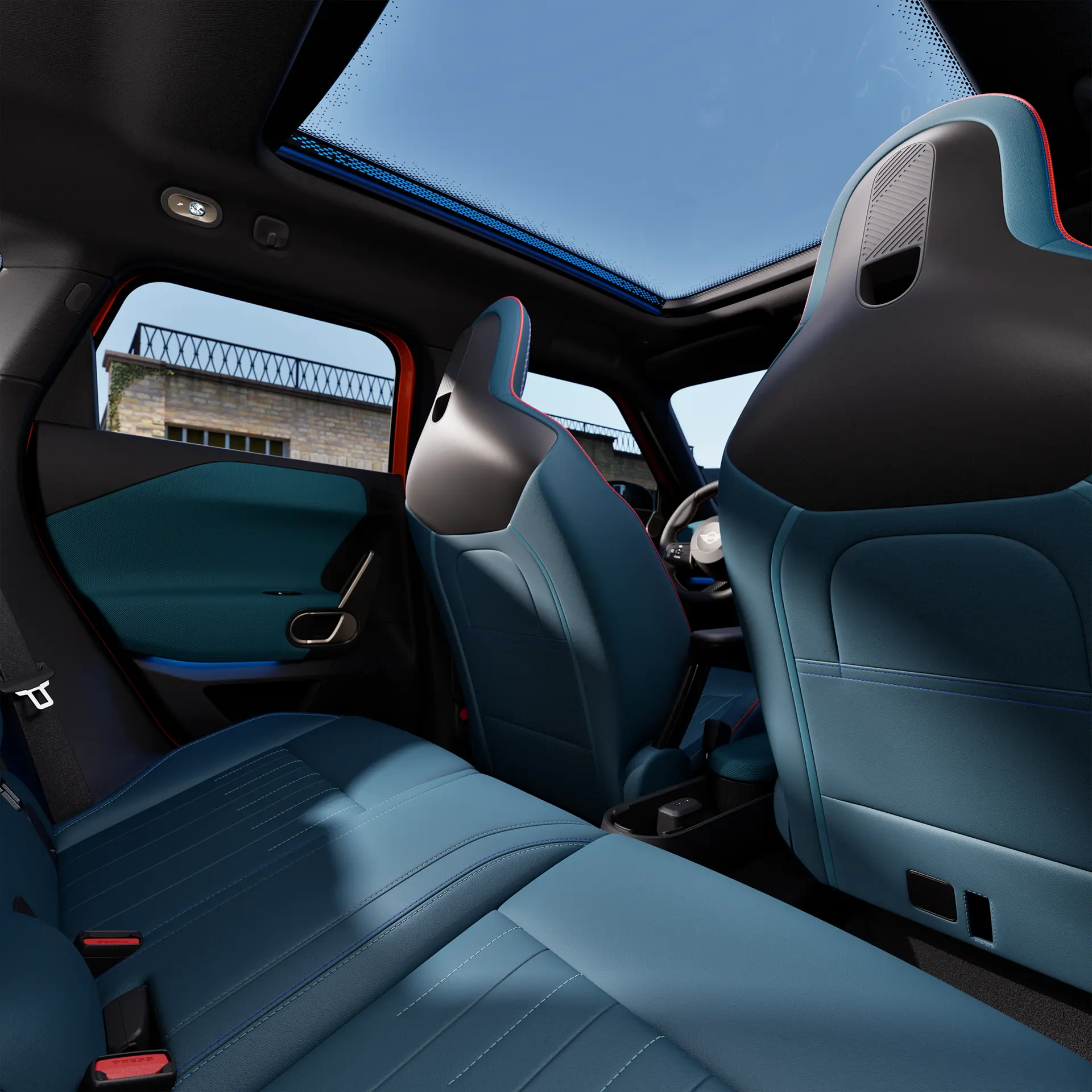 Interior view of all-electric MINI Aceman with blue seats and view through the panoramic sun roof