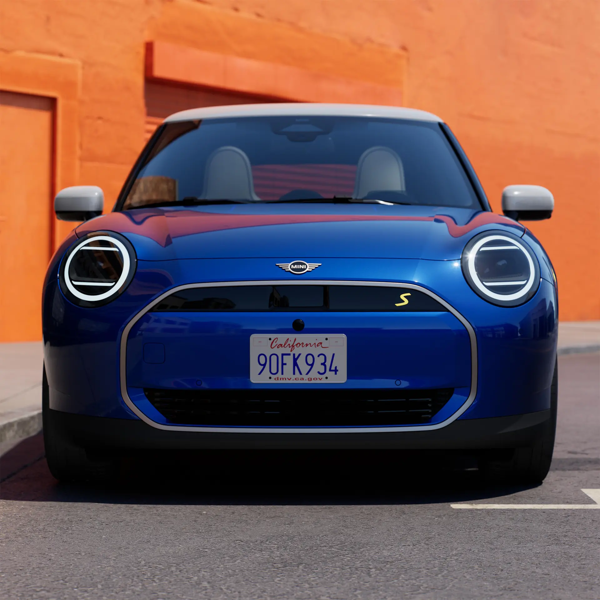 Frontal view of parking all-electric MINI Cooper in blue