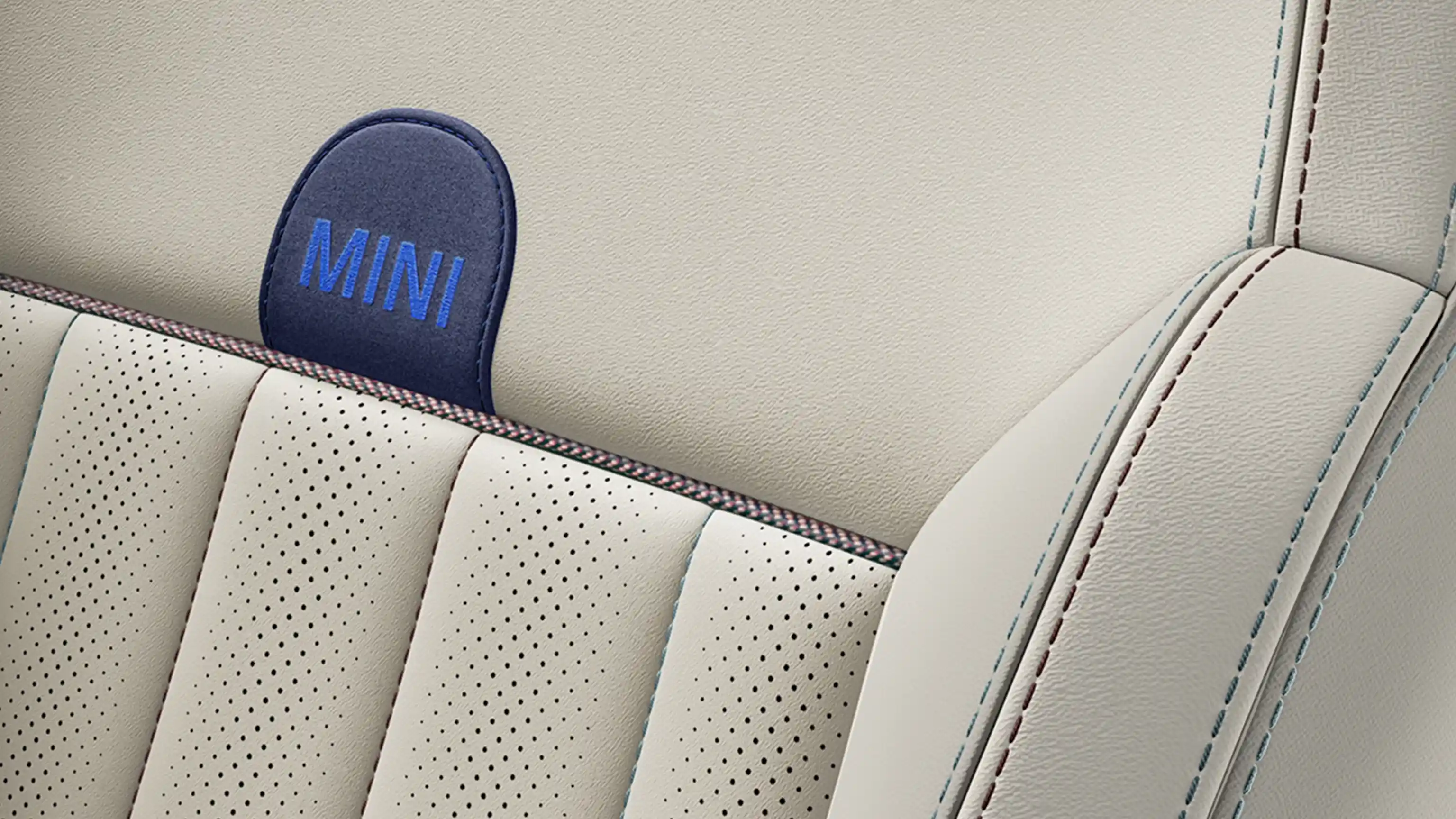 View of the all-electric MINI Countryman Favoured Style seats in Beige Vescin
