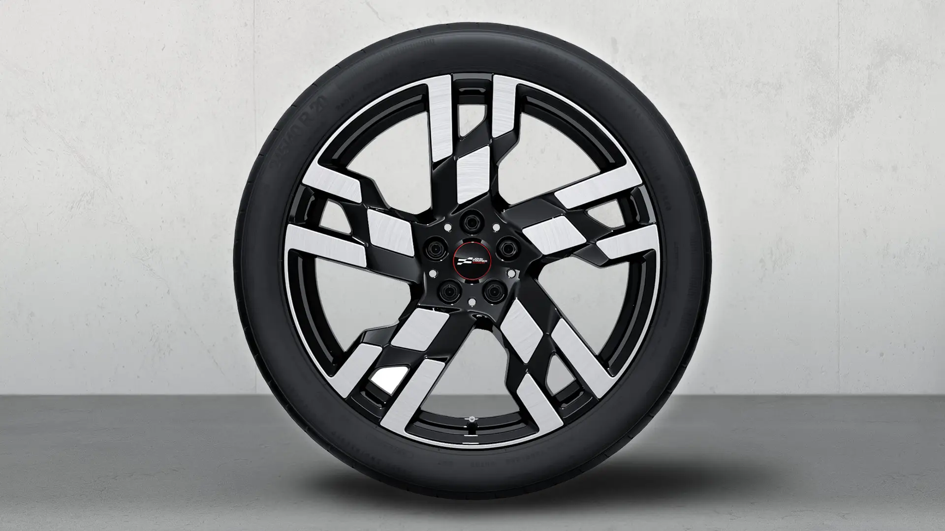 20'' John Cooper Works light alloy winter wheel Flag Spoke style 949 in Bicolour Jet Black, gloss lathed. 