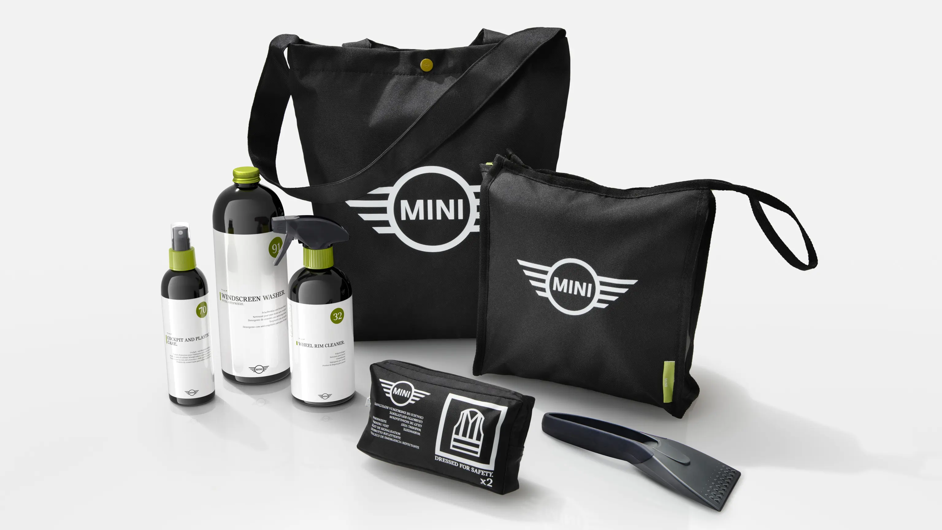 MINI cleaning and care products with car shampoo, wheel rim cleaner, windscreen washer, ice scraper and sturdy MINI bags