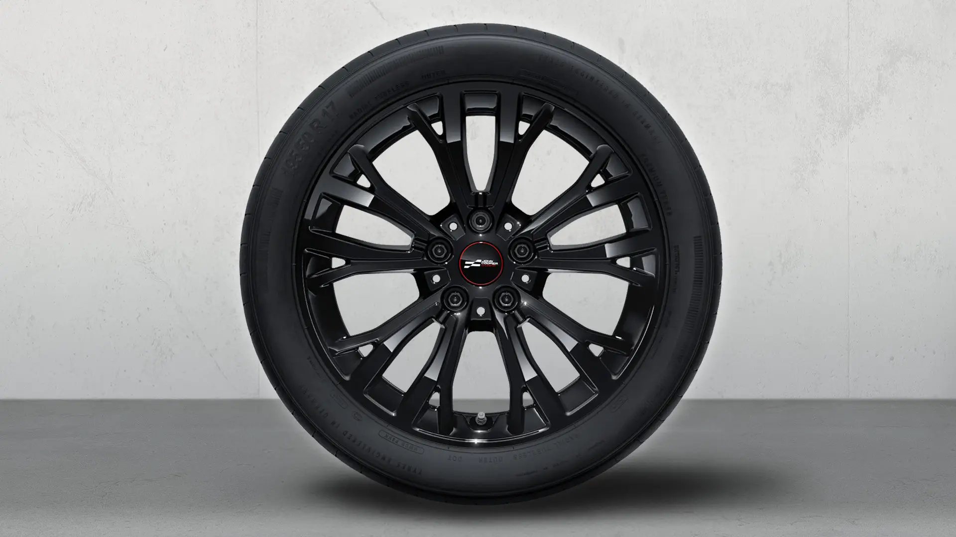 17" John Cooper Works light alloy wheel Star Spoke style 962 winter complete wheel in Jet Black.