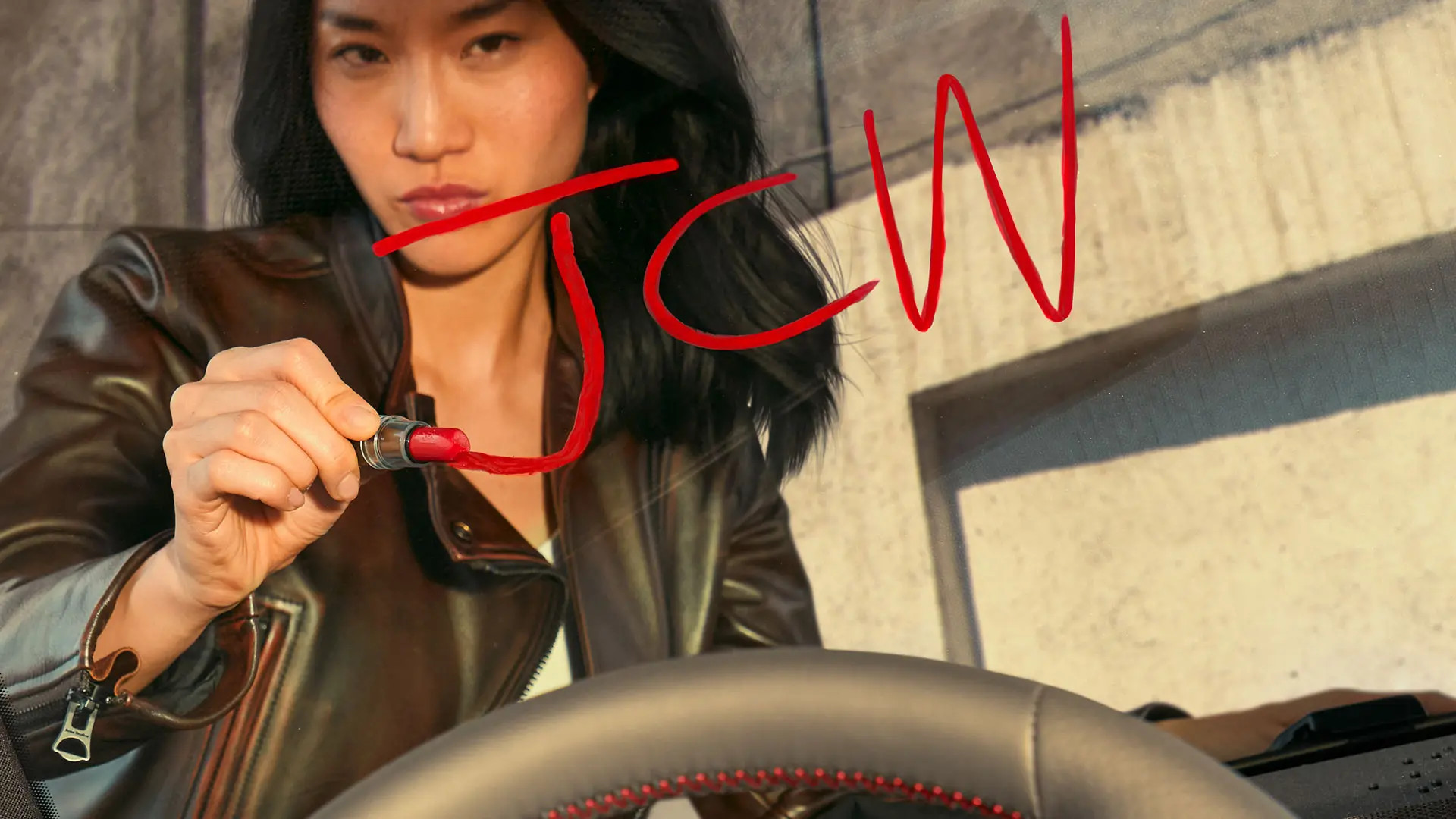 Woman at a MINI Centre waiting for JCW test drive. 