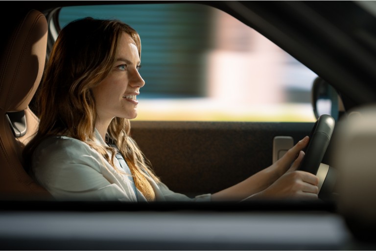 Woman driving a MINI detail